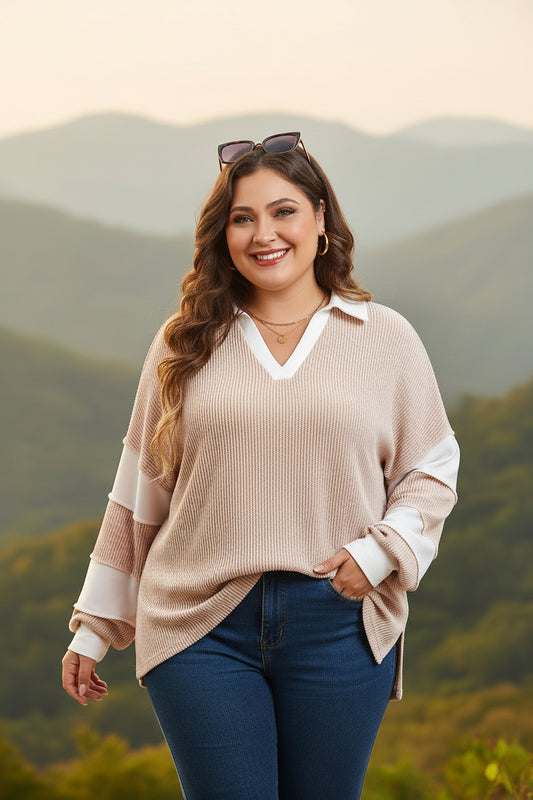 Woman wearing a beige ribbed sweater and ripped jeans indoors with balloons in the background
